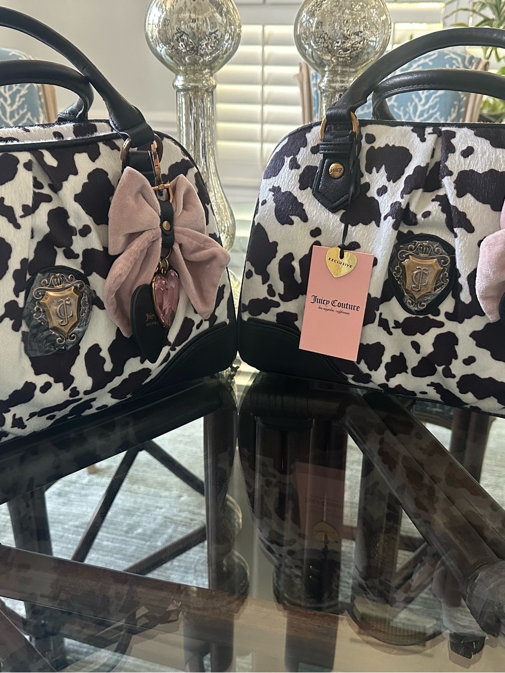 Juicy Couture Black & White Cow Print Satchel with Pink Bow Charm